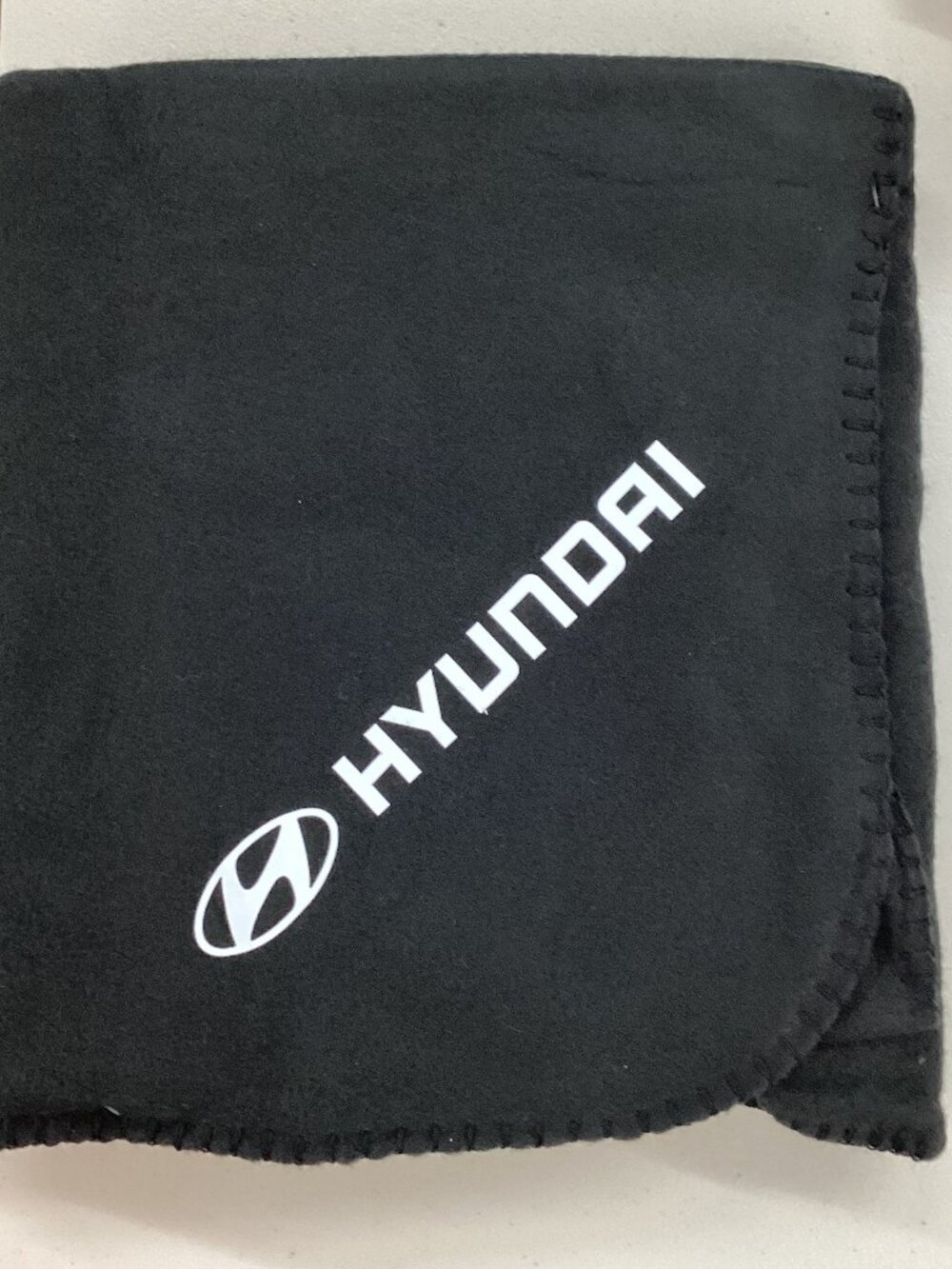 Hyundai Black Fleece Blanket stylish and cozy addition to any bedroom
